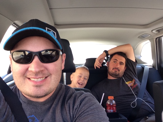 A photo of Dad, Hiatt, & Scotty driving to Utah